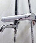 Heavy Duty Solid Brass Thermostatic Mixing Valve For Concealed Wall Piping Featuring Spot On Temp Control and No Sweat Installation For Modern Restroom Upgrades mounted on tiled wall.