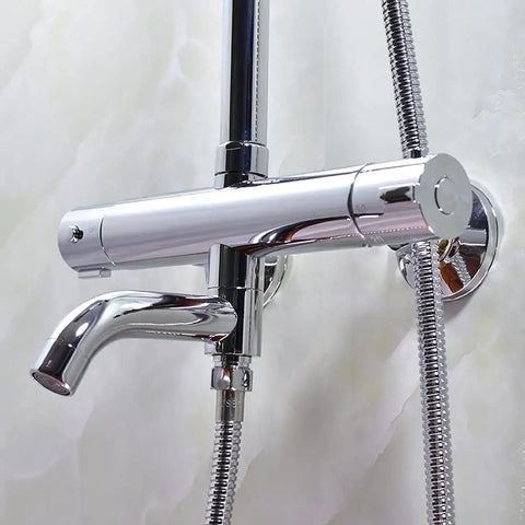 Heavy Duty Solid Brass Thermostatic Mixing Valve For Concealed Wall Piping Featuring Spot On Temp Control and No Sweat Installation For Modern Restroom Upgrades mounted on tiled wall.