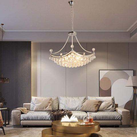 Modern Crystal Chandelier Pendant Light With Silver Finish, 25 Inch Ceiling Fixture in living room setting