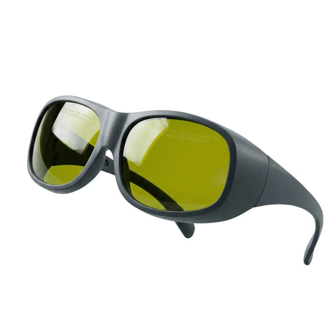 Badass Laser Safety Glasses With Sleek High Density Lenses Blocking Mean Laser Beams For Welding And Hair Removal Jobs Featuring rugged black frame and green lenses.