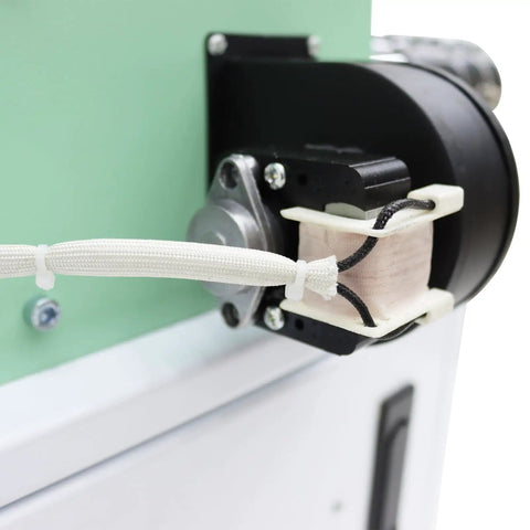 Close-up of Pro Grade Single Screw Filament Extruder showing motor and wire feeding mechanism for 3D printer material.