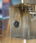 Close-up of the gauge on the Top Tier Dual Boiler Espresso Maker With Smart Thermoblock And Precise PID Temp Control in stainless steel.