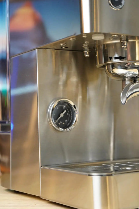 Close-up of the gauge on the Top Tier Dual Boiler Espresso Maker With Smart Thermoblock And Precise PID Temp Control in stainless steel.