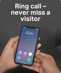 User holding smartphone with video call interface for Hella Crisp 2K Wireless Smart Video Doorbell With Built In Chime.