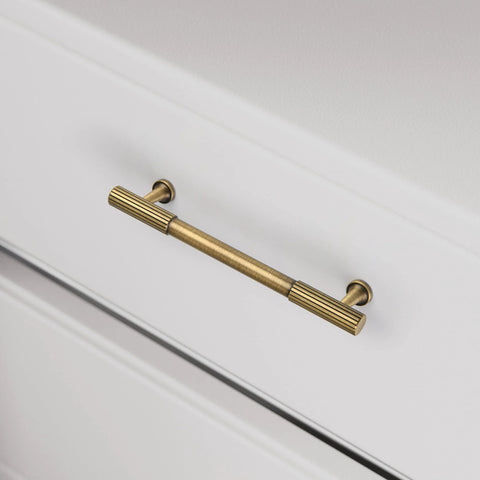 Five Pack Antique Solid Brass Cabinet Handles 5 Inch Center To Center Dresser Drawer Pulls Brushed Bronze Finish installed on dresser