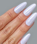 Close-up of a hand with white glossy nails applied with Pro Quick Dry Nail Glue For False Nails And Tips That Delivers A Strong Hold