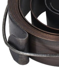 Close-up of heavy duty drill press return spring coil replacement for quill with durable spring steel for horizontal and vertical drills.