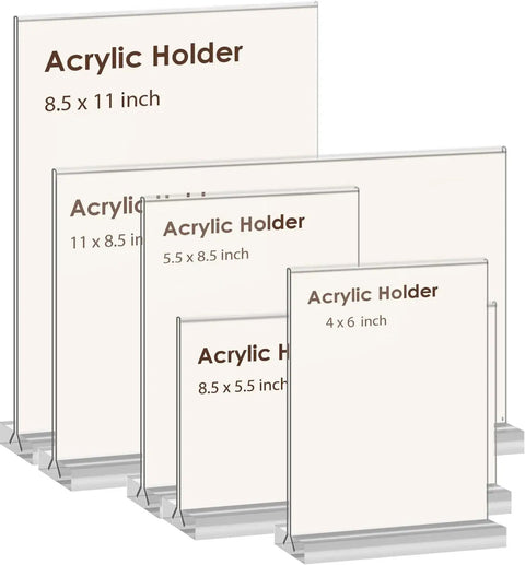 Various sizes of clear acrylic sign holders including 8.5x11, double-sided for menus and promotions, standing on a table.