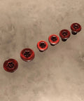 Premium Red Replacement Scale And Pivot Torx Screws For Spyderco Manix 2 G10 Manix 2 XL Set Of 6 on a gray surface.
