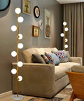 Cozy Elegant Mid Century Floor Lamp With Nine Lights For Living Room, Bedroom, And Office, Warm White 2700K Ambience next to a sofa