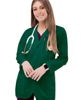 Pro Approved Unisex Lab Coat For Healthcare Crew Featuring Stacks Of Storage In Dual Patch Pockets And A Handy Chest Divider Classic Hunter Green Cut With A 31 Inch Back Hem Built Tough For Long Haul Clinic Days on a model with a stethoscope.