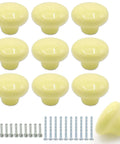 Light Yellow Ceramic Cabinet Knobs And 32 Millimeter Round Drawer Pulls Featuring A Knockout Matte Finish And Dang Easy Hardware Setup For Kitchen Cupboards And Vanities Snagged In A Ten Pack Bundle, shown with brass screws.