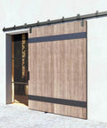 Rugged Heavy Duty 12 Foot Exterior Sliding Barn Door Hardware Kit for Outdoor Use Wall Mount Track System shown installed