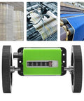 Super Smooth Digital Rolling Meter Counter With Kickass Six Digit Display For Precise Textile And Faux Leather Length Measurement Zero Hassle Tracking And Nail It Exactness On Every Yard, featuring dual wheels and a green body.