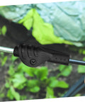 Close-up of a black tent pole connector joint in use, part of the Camping Tent Pole Connector Joint Set Four Pieces For Quick Assembly And Easy Repair Keeps Tent Poles Stable In Wind DIY Tent Repair Kit For Campers And Hikers Ultra Reliable Pole Adapters.