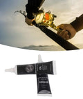 Fishing Reel Lubrication Kit With Pro Grade Maintenance Oil And Grease near a fishing pole in use, waterproof and rust resistant