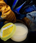 High Performance No Clean Solder Flux Paste For PCB And BGA Repair next to welding action and protective gloves