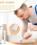 Man using Two Piece Stainless Steel Pry Bar Scraper Set With Gloves Includes Six Point Six Nine Inch And Ten Inch Flat Pry Bars for carpentry.