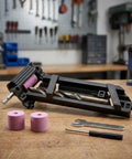 Portable Drill Bit Sharpener With Adjustable Angle Jig for quick revival of dull bits on a workbench with grinding pads.