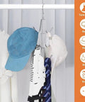 Rotating multi strap backpack hook, 2 Pack Closet Purse Hangers organizing hats and scarves on a silver rack.