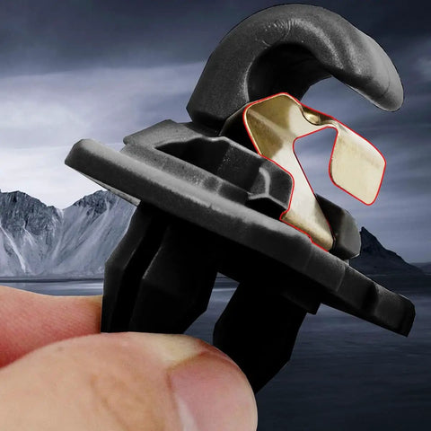 Close-up of Audi Inner Sun Visor Clips 2Pack Upgraded Interior Sunscreen Holder Hook in black with a mountain background