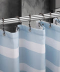 Rust Resistant Double Glide Shower Curtain Hooks Set Of 12 In Bronze Finish on a silver rod holding blue striped curtain