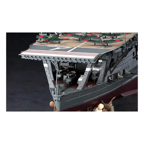 Detailed view of the bow of the Top Shelf Japanese Imperial Akagi Aircraft Carrier Scale Model Kit with aircraft on deck.