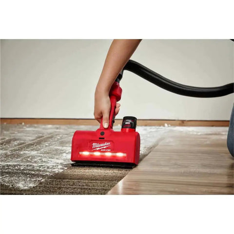 M12 Air Tip Utility Nozzle Gonna Handle Any Mess Without Raising Hell Silver Hand Vac Attachment in use, cleaning dust from floor.
