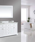 Modern bathroom with white double vanity, marble countertop, large mirror, and freestanding bathtub