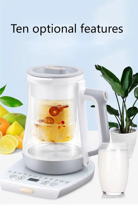 2 Liter Multifunctional Electric Kettle And Coffee Pot With Built In Strainer Stewing Cup Health Focused Water Boiler Top Tier Kitchen Essential Smooth Operator For Daily Brewing And No Stress Cooking with fruits in the brewing chamber.