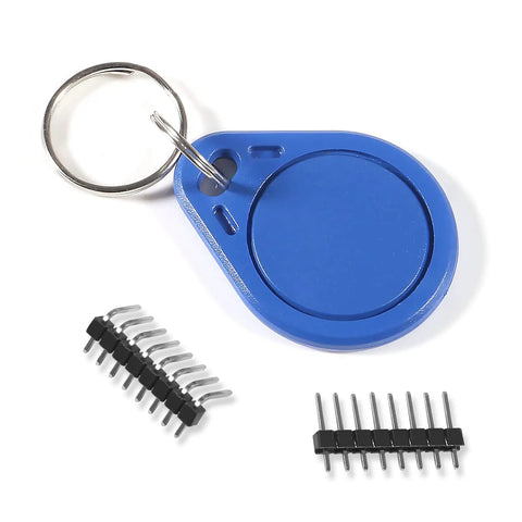 Blue key ring and pin headers from 5Pcs RFID Kit With Mifare RC522 Reader Module For Development Projects, RF IC Card Sensor Module, S50 White Cards And Key Ring Included, Plug And Play DIY Starter Set For Arduino And Raspberry Pi.