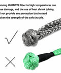 Comparison of gray UHMW Polyethylene and green soft shackle rope showing durability for 2Pcs Synthetic Soft Shackle One Half Inch By Twenty Two Inch, 56,000 Lb Breaking Strength, With Extra Sleeves, Gray, UHMW Polyethylene Tow Shackle Heavy Duty For Boating, Camping, Off Road Recovery.