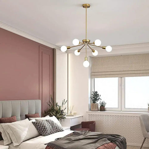Gold Sputnik 7-Light Modern Pendant Chandelier With Deformable Arms in bedroom, adjustable height, mid-century vibe brass modern lighting.