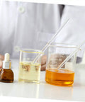 Lab setup with beakers and droppers, related to Two Pack Glass Electrostatic Experiment Sticks With Silk Cloth For Static Electricity Learning