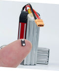 Hella Reliable 100 Piece SMD Rectifier Diode Pack Built Tough For High Voltage Circuits Rock Solid Replacement Parts For Automotive Power Supplies And Industrial Jobs, showing finger holding a small diode next to a large heat sink.