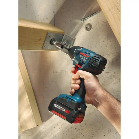 Compact 18V One Quarter Inch Hex Impact Driver Bare Tool With Built In LED Light in use on wooden structure