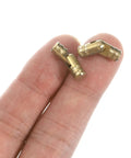 Slick Invisible Brass Barrel Hinges 24 Pack 5X17mm Concealed Woodcraft Hardware For Jewelry Boxes shown in hand.