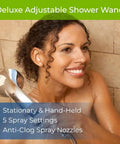 Woman using Boss Shower Filter System with Deluxe Adjustable Wand in Brushed Nickel Finish in shower