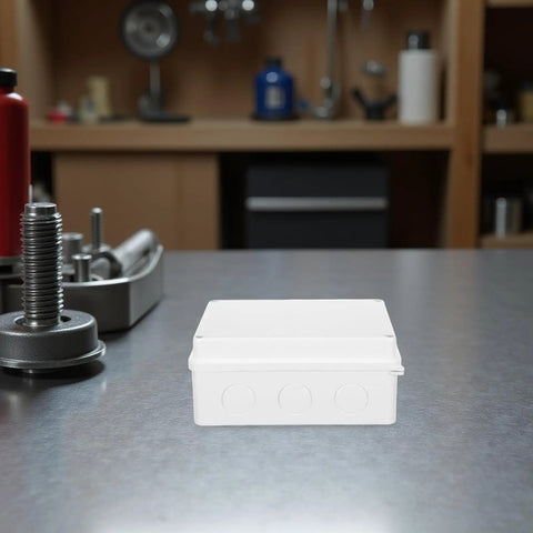 Cool 13 Piece I P65 Waterproof Junction Box Kit For Electrical Projects, white plastic enclosure on a workbench.