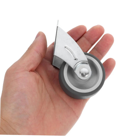 Premium Barn Door Floor Guide Roller Slider Kit With Ridiculously Slick Caster Wheels And Quick Fit Mounting Screws, gray roller in hand.