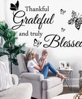 Thankful Grateful And Truly Blessed Inspirational Quote Vinyl Wall Decor in a cozy living room setting with armchair.