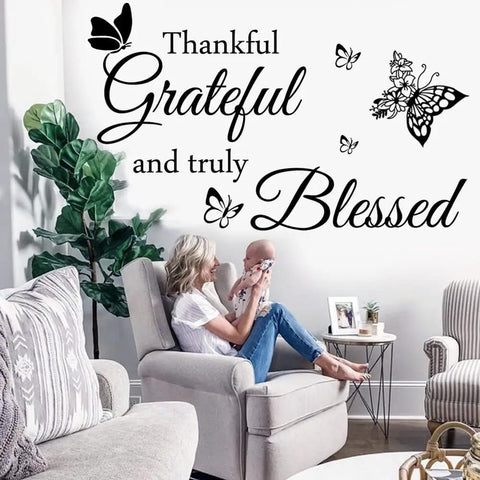 Thankful Grateful And Truly Blessed Inspirational Quote Vinyl Wall Decor in a cozy living room setting with armchair.