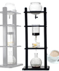 Heavy Duty Cold Brew Drip Tower Coffee Maker One Liter Glass Iced Coffee Brewer with wood frame and brewing process visible.