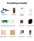 Artilume T1 laser engraver kit: blue frame, laser head, manual, toolkit, goggles, sheets, power adapter, data cable.