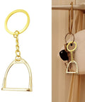 Elegant Stirrups and Snaffle Bit Key Rings D Shaped Keychain Made from Sturdy Alloy for Equestrians and Horse Lovers on hook