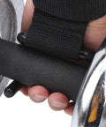 Close-up of a hand gripping a dumbbell with a Pair Of Pro Steel Weight Lifting Hooks For Deadlifts And Shrugs With Neoprene Wrist Straps