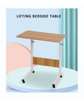 Smooth Rolling Mobile Laptop Stand With Hella Spacious Top And Adjustable Height Portable Overbed Desk For Beds Sofas Or Wheelchairs Solid Home Office Flex with lifting bedside design and wooden top.