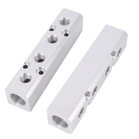 Four Way Six Port Aluminum Air Manifold Air Distribution Block One Quarter Inch NPT Output And One Half Inch NPT Supply Port For Compressors And Pneumatic Systems lying side by side