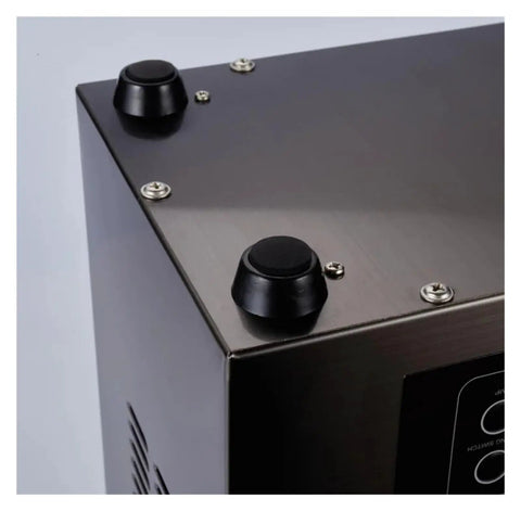 Close-up of Industrial Ultrasonic Cleaner With Digital Display And Six Liter Tank's top corners with rubber feet.