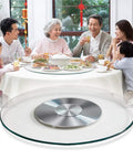 Family dining with Rotating Lazy Susan Turntable With Glass Top And Silent Bearing, Heavy Duty Metal Tray in use on table.